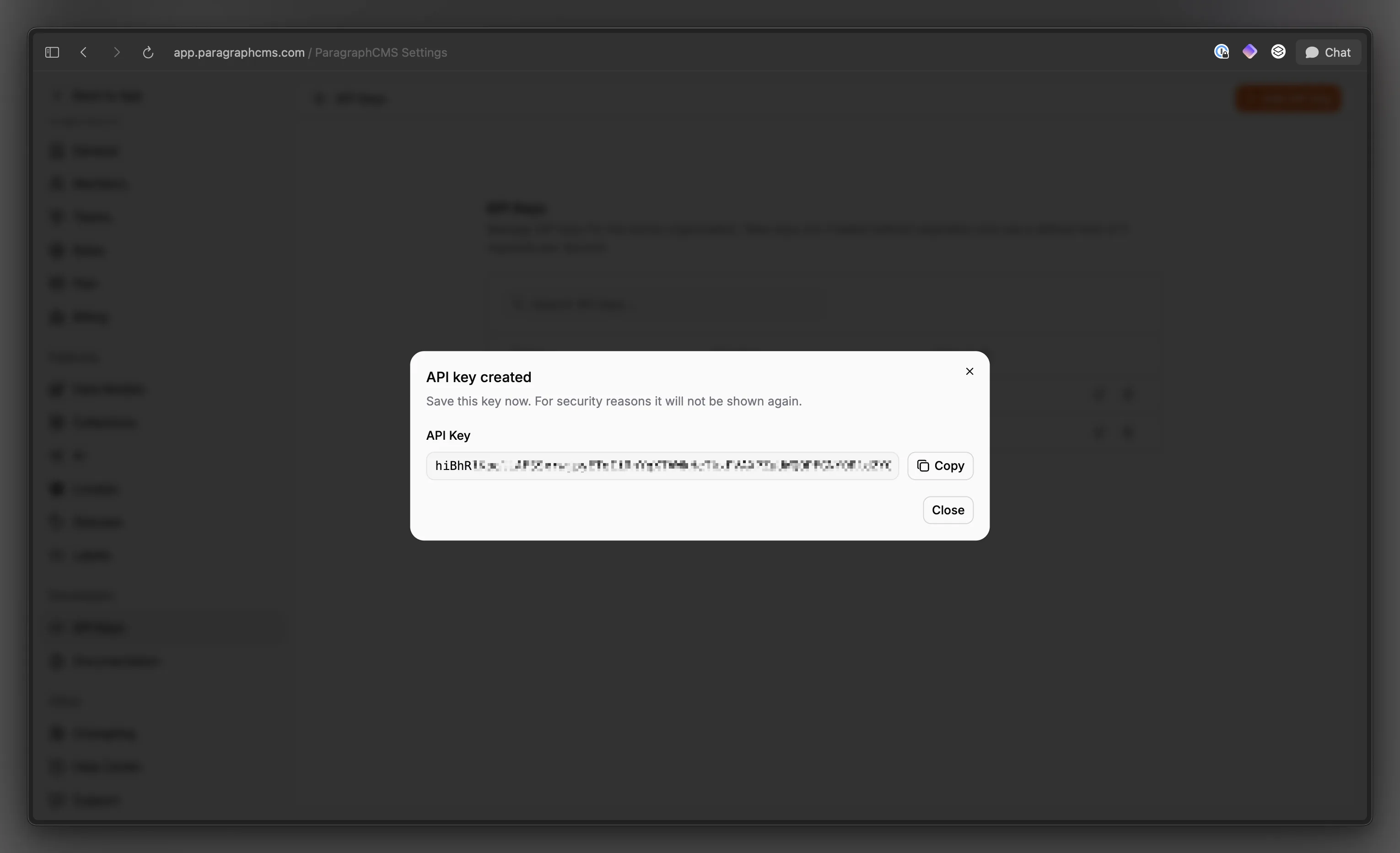 API key created dialog showing the one-time secret value and copy action.
