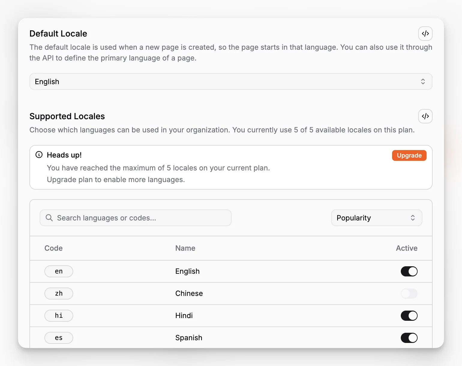 Página de configuración de idiomas de Paragraph CMS que muestra opciones de idioma con búsqueda, insignias de código e interruptores de activación.