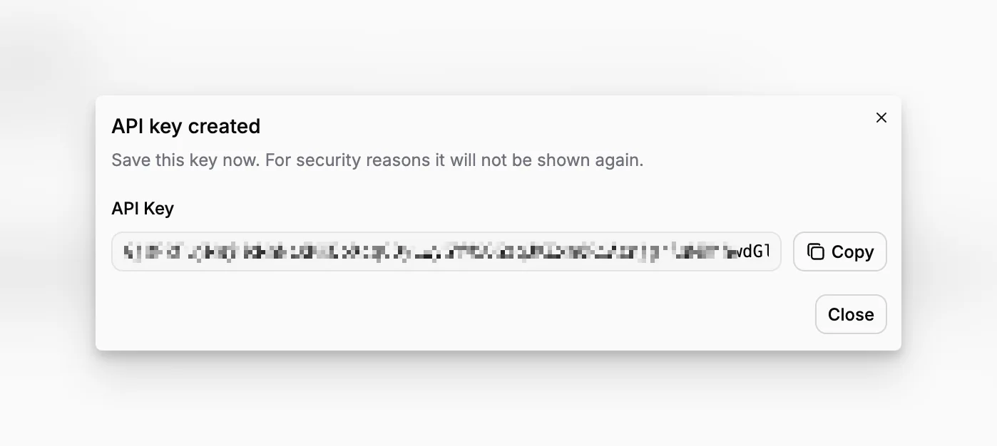 Blueputto API key created dialog with the one-time key value and copy button.